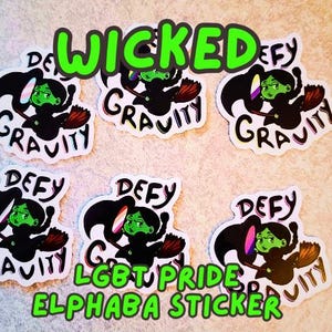 May include: A collection of stickers featuring a green-skinned witch character with black hair and a broom. The stickers have the words "WICKED", "DEFY", and "GRAVITY". The text "LGBT PRIDE ELPHABA STICKER" is also present.