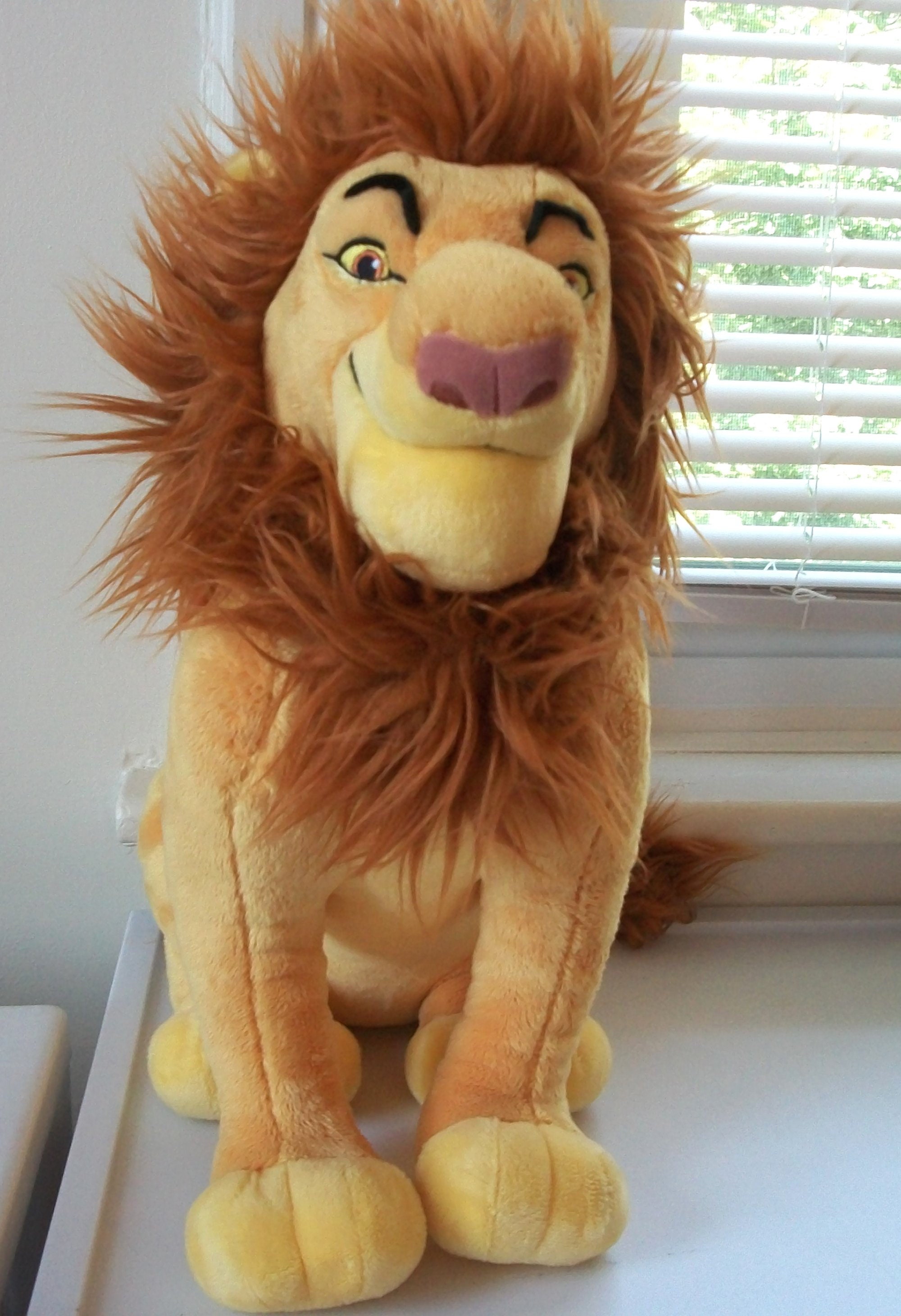 lion king plush ride on toy