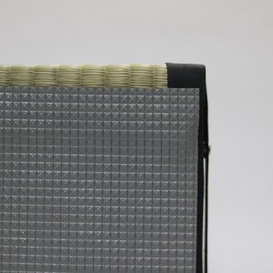 This is a bottom-view shot of the Agura Tatami cushion.
The cushion features a soft, non-slip base that keeps it securely in place on various floor surfaces, helping maintain a stable seated posture. Designed for comfort and focus, it’s ideal for Zen meditation, mindfulness practice, and moments of quiet reflection.