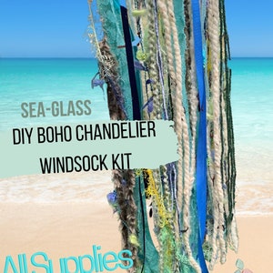 May include: DIY Boho Chandelier Windsock Kit with sea glass accents. All supplies included. The kit features a variety of textures and colors, including white, blue, green, and brown.