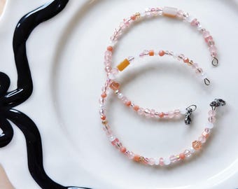 Handmade Peach Glass Bead Bracelet: Elegant Metallic Jewelry