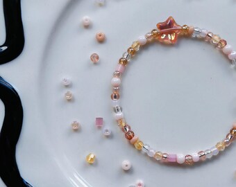 Handmade Gold & Peach Glass Bead Bracelet with Star