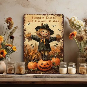 May include: A rustic wooden table with a bench, adorned with fall decor. A metal sign with a scarecrow and pumpkins reads "Pumpkin Kisses and Harvest Wishes." Vases of flowers and jars with contents complete the autumn scene.