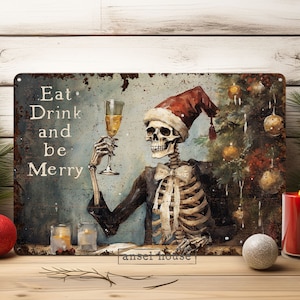 May include: A metal sign with a rusty background featuring a skeleton wearing a Santa hat and holding a glass of wine. The sign says "Eat, Drink and be Merry".