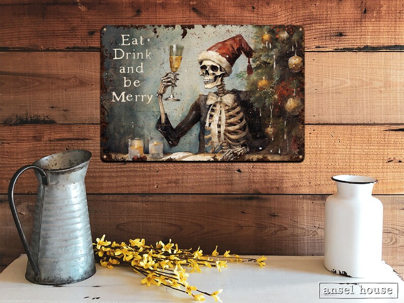 May include: A metal sign with a distressed, vintage look featuring a skeleton wearing a Santa hat and holding a glass of champagne. The sign reads "Eat, Drink and be Merry".