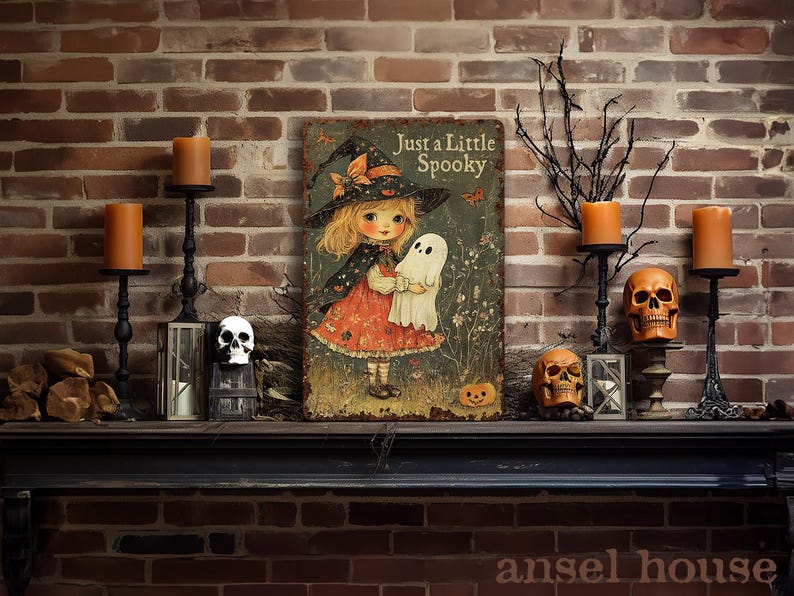 May include: A Halloween-themed metal sign with the text "Just a Little Spooky" featuring a witch holding a ghost. The sign is surrounded by candles, skulls, and a pumpkin on a brick mantel.