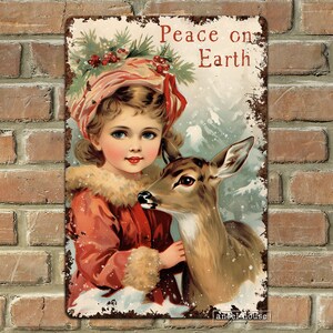 Puede incluir: Un cartel vintage de Navidad con una ni&ntilde;a peque&ntilde;a con un abrigo rojo sosteniendo un cervatillo. El cartel tiene un fondo blanco con el texto "Peace on Earth" en letras rojas.