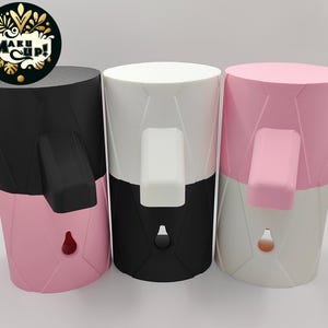 May include: Three silicone soap dispensers with a two-tone design. The dispensers are black and pink, white and black, and pink and white.