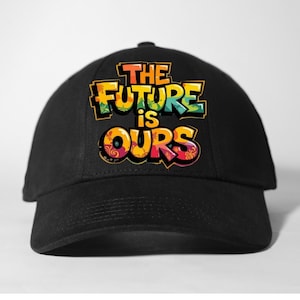 May include: Black baseball cap with the text "THE FUTURE is OURS" in colorful, graffiti-style lettering. The text features orange, yellow, green, and red accents. The cap has a curved brim and a rounded crown.