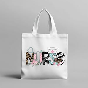 May include: White tote bag with the word "Nurse" in a colourful design. The letters have a leopard print, floral, and medical-themed accents, including a stethoscope, nurse's cap, and syringe. The bag is ideal for carrying books, groceries, or personal items.