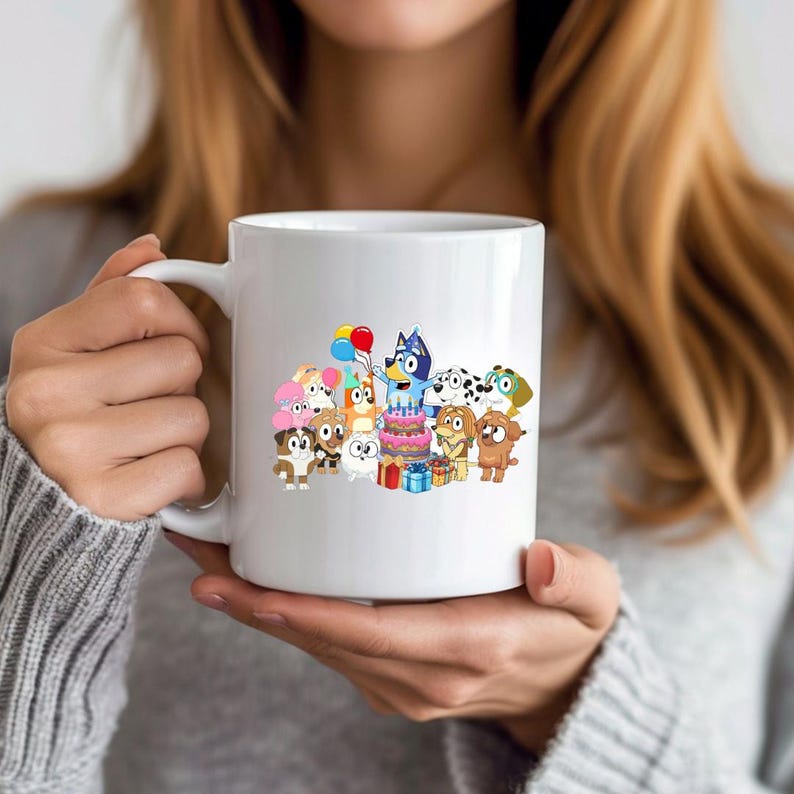 May include: White ceramic mug featuring a colorful cartoon illustration of various dog characters celebrating a birthday. The design includes a cake, balloons, and wrapped gifts, perfect for a fan of the animated series.