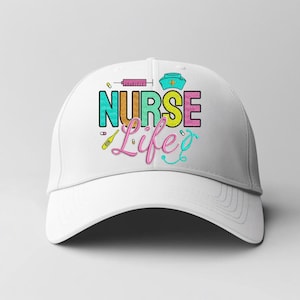May include: A white baseball cap featuring the embroidered text "NURSE Life". The design incorporates a syringe, a nurse's hat, a thermometer, and a stethoscope in various bright colours. A cap for nurses.