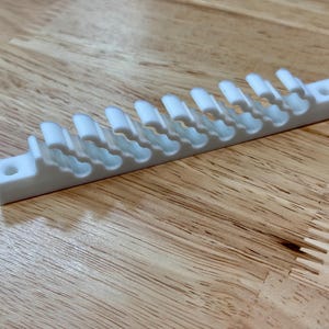 Ethernet 26-Cable Comb Mount with Screw Holes. Fits Cat5, Cat5e, and Cat6