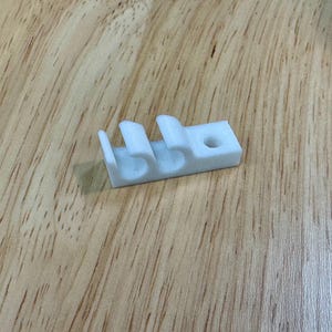 Ethernet 2-Cable Comb Mount with Screw Hole. Fits Cat5, Cat5e, and Cat6