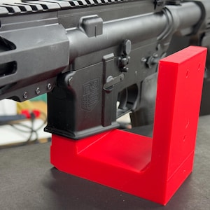 Soporte de pared extendido para rifle AR