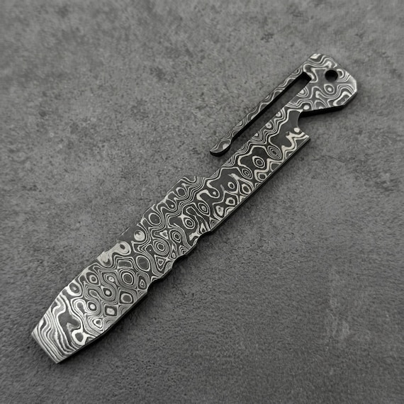 Damascus steel prybar with a bottle opener forged by hand — 100 favorites confirms this is the rare EDC multitool that looks like a piece of art.