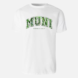 May include: White t-shirt with a green and white "MUNI" graphic with the text "SIDEWAYS GOLF" underneath.