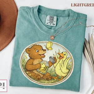 adorable bear and duck shirt soft vintage kids animal tee
