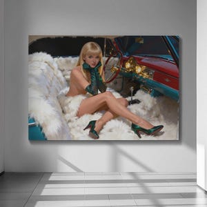 May include: A framed artwork shows a woman in a classic car. She wears green gloves and heels, seated on a fluffy white surface. The car's interior is red and teal, with a steering wheel and headlights visible.