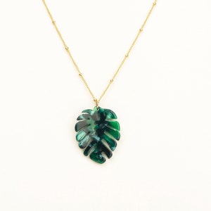 Bright green monstera leaf with stunning detail placed on a high-end satellite chain in 14kt gold or rose fill or sterling silver.  Perfect plant lover gift!