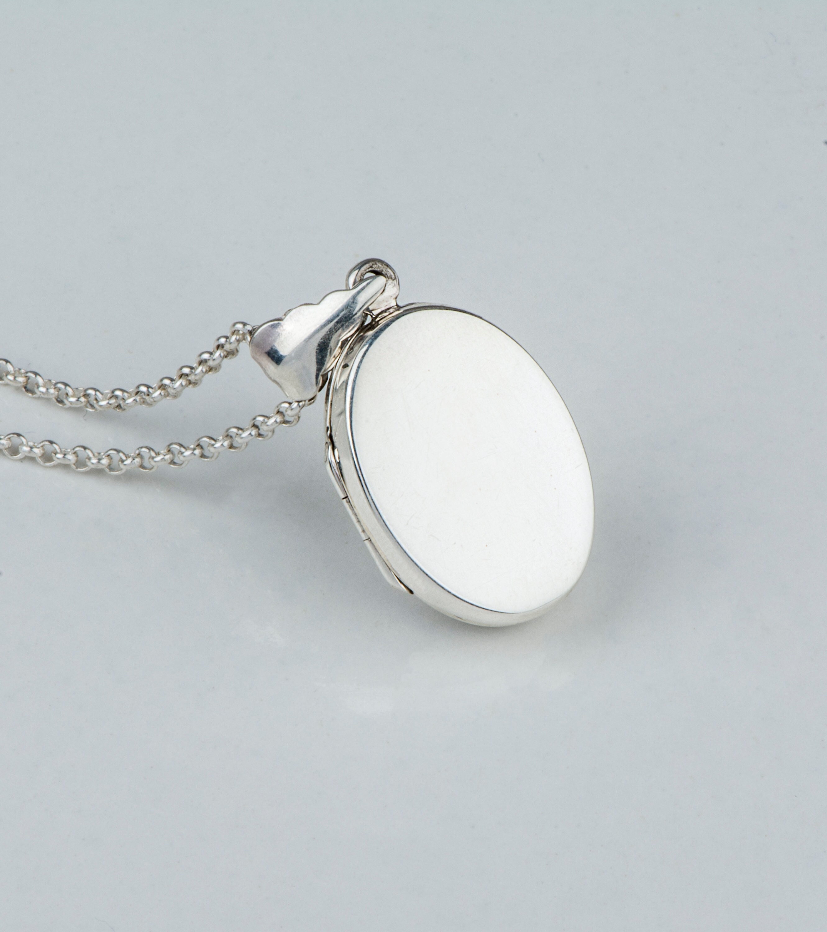 Preowned Sterling Silver Small Oval Engraved Locket Pendant