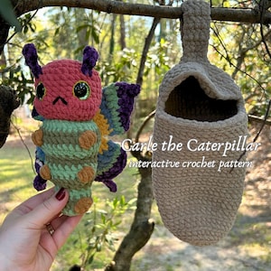 May include: A handmade crochet caterpillar toy with a matching cocoon. The caterpillar is pink, green, and brown with large, glittery eyes. The cocoon is a light beige color. The text "Carle the Caterpillar interactive crochet pattern" is visible.