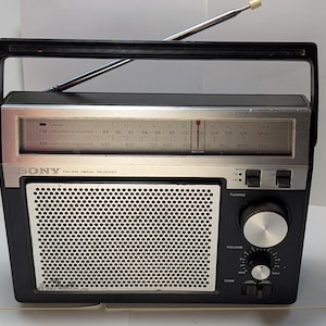 Silver Tone Portable Radio - Sony AM/FM 2 Band Receiver Model TFM-7720W - 1970s Sharp Retro Style with Battery + Cord Power