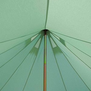 May include: A light green tent interior with a central brown pole. The tent's fabric radiates outwards from the top, creating a starburst pattern. The design includes reinforced sections and seams.
