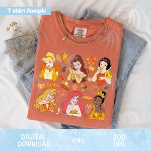 May include: Orange Comfort Colors t-shirt featuring cartoon illustrations of Disney princesses with fall-themed elements. The shirt includes the text "T-shirt Sample", "DIGITAL DOWNLOAD", "PNG", and "300 DPI".