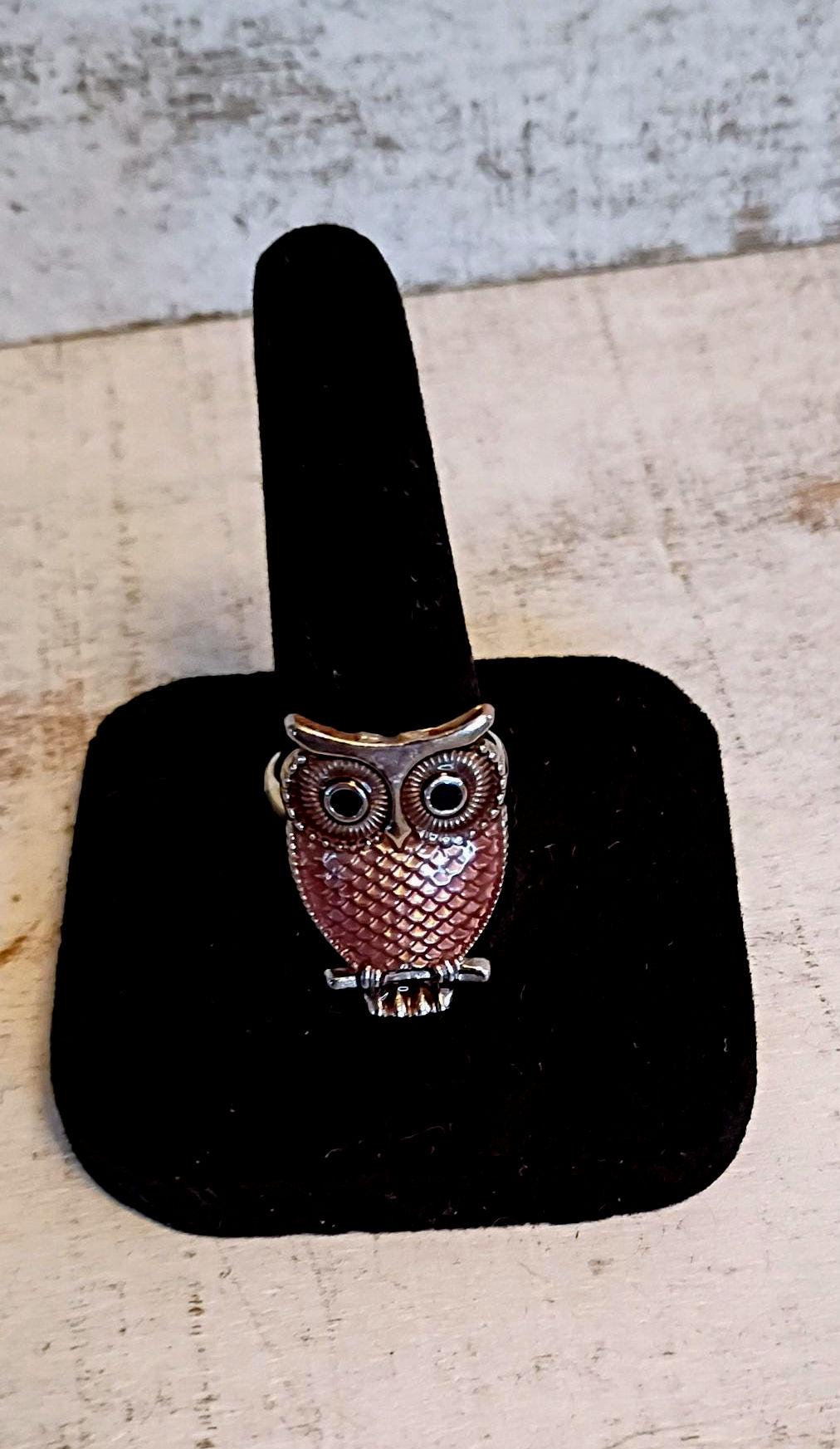 Sliver fidget,  spinning owl ring.