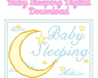 May include: A cross-stitch design with the words "Baby Sleeping" in light blue script, a yellow crescent moon, and stars. The words "Baby Sleeping Digital Download" are in pink script at the top. The design is framed with a light blue border.