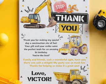 May include: A rectangular thank you card featuring yellow construction vehicle illustrations, including an excavator, tractor, and dump truck. The text reads: Thank you for making my special day a construction site of fun! Love, VICTOR!