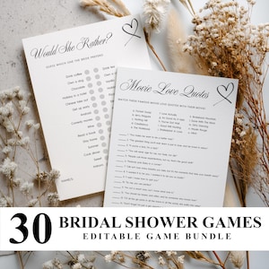 May include: Two white paper game cards with black text and heart illustrations. One card is titled Would She Rather with a list of choices, and the other is titled Movie Love Quotes with a list of fourteen quotes to match with movie titles.
