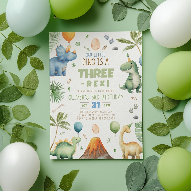 May include: A rectangular birthday invitation card featuring watercolor illustrations of various dinosaurs, a volcano, and balloons. The text reads: Our little dino is a three-rex! Please join us to celebrate Oliver's 3rd birthday, Oct 31, 3 PM, The Jackson's residence, 123 any street, New York, NY, RSVP to Angela 555.555.5555.