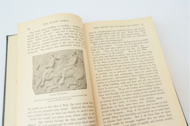 May include: A black and white image of a marble relief sculpture depicting two figures on horseback. The sculpture is from the Parthenon in Athens, Greece. The text "Greek Horsemen" is below the image.
