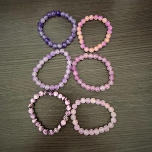 Pack of 6 purple stretchy beaded bracelets