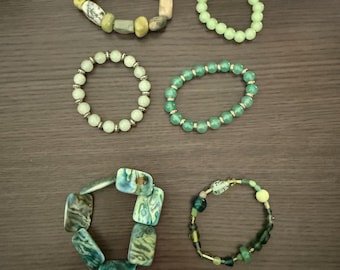 Pack of 6 green stretchy beaded bracelets