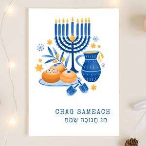 May include: A white card with a blue menorah, a blue pitcher, and orange pastries. The card has the text "CHAG SAMEACH" in English and Hebrew. The card is decorated with yellow stars and blue snowflakes.