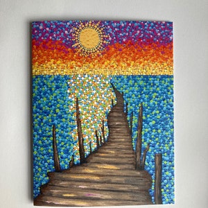 Tarjeta de felicitación con notas y texto "Puesta de sol en el muelle Dotty"