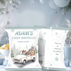 May include: White chip bags with a winter theme. The front of the bag reads "ADAM'S FIRST BIRTHDAY December 25, 2025" and features a watercolor illustration of a white truck carrying woodland animals. The back of the bag says "Thank You for Celebrating Our ONEderful Day!"