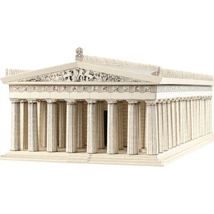 Assembled 3d paper model of the Parthenon, the former temple of Doric order on the Athenian Acropolis, Greece, dedicated to the goddess Athena. The model is placed in three quarters view featuring colonade, the west pediment, metopes, the roof.