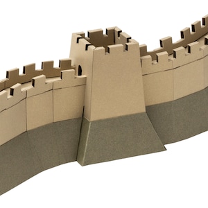 Closeup of the assembled 3d paper model of the Great Wall of China. The view fetures a tower and two wall segments with crenellation.