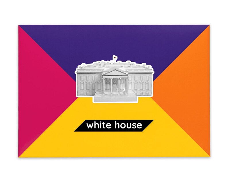 Product packaging for the White House paper model kit. The bright-colored cardstock envelope features an image of the finished model at the center and the product title below.