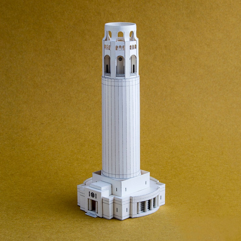 Assembled a 3D paper model of the Coit Tower, an iconic architectural landmark for San Francisco. The model is made out of beige cardboard pieces with black printed details.