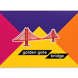 Packaging for the Golden Gate bridge paper model kit. A rectangular bright coloured cardstock envelope features four large triangles in yellow, magenta, purple and orange with an image of a finished model at the centre and the product title below.