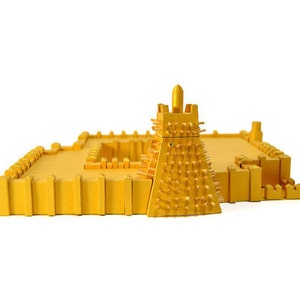 Assembled 3d scale model of the Sankoré Mosque, one of three ancient learning centers located in Timbuktu, Mali. The model is made out of golden paper parts, it features the pyramidal mihrab and inner courtyard.