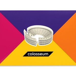 Product packaging for the Roman Colosseum paper model kit. A recangular bright coloured cardstock envelope features four large triangles in yellow, magenta, purple and orange with an image of a finished model at the centre, the product title below.