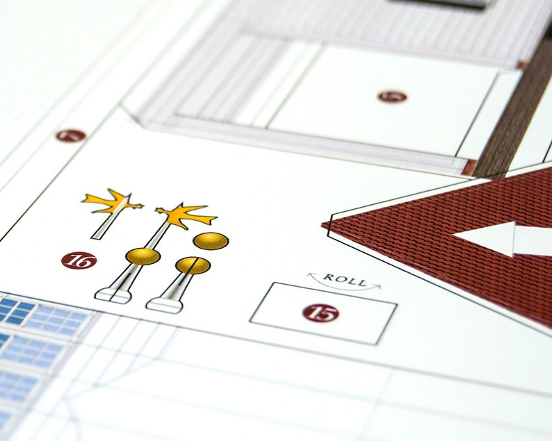 Closeup of the worksheet with printed paper parts to be cut out and assembled in order to make a scale model of the Mount Vernon mansion.