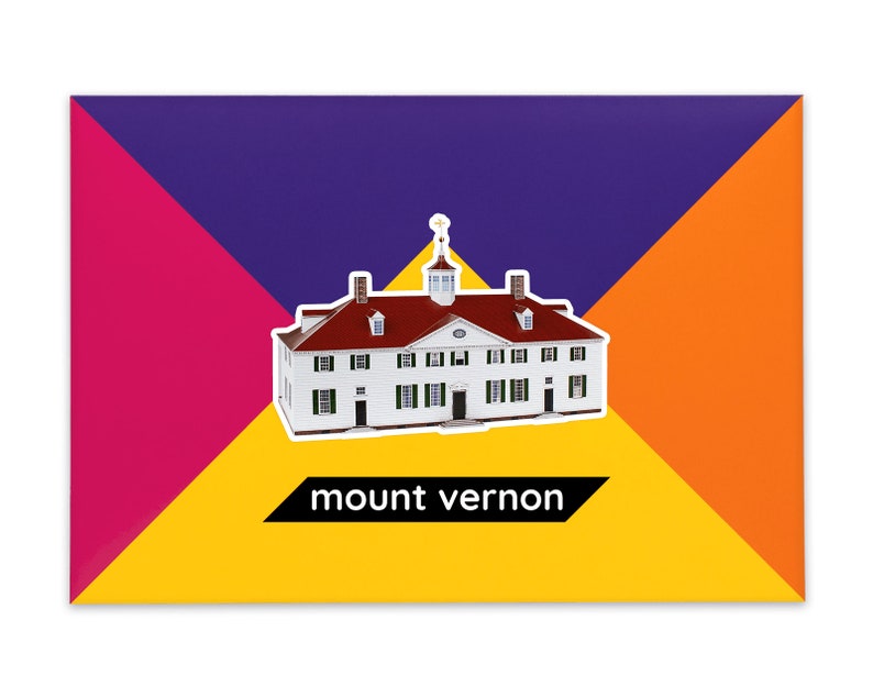 Product packaging for the Mount Vernon paper model kit. A rectangular bright coloured cardstock envelope features four large triangles in yellow, magenta, purple and orange with an image of a finished model at the centre and the product title below.