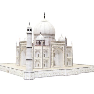 The angled exterior view of the 3D paper model of Taj Mahal shows its central dome, four kiosk domes, and four minarets which are aligned on a base.